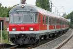 Ein Karlsruher Steuerwagen wird gerade von 110 373-8 fr den RE4 Verstrker nach Dsseldorf gefahren, aufgenommen am 23.07.2009 in Erkelenz