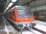 Ein Bnrdzf 483 mit einer 143 als Schublok als RE nach Aalen in Stuttgart Hbf. Februar 2010.