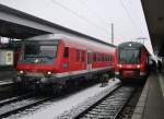 Ein Wittenberger Steuerwagen und 440 307 stehen am 21.Januar 2012 als RB 59675 nach Allersberg und als RB 58792 nach Neustadt(Aisch) im Nrnberger Hbf.