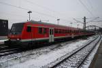 Hier eine RB77 (RB21118) von Neumünster nach Kiel Hbf., bei der Einfahrt am 19.1.2016 in Kiel Hbf. Schublok war 143 163-4.