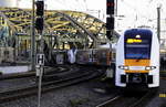 462 042 und 034 bilden den RE 6 Köln/Bonn Flughafen - Minden, hier bei der Einfahrt in den Kölner Hbf am 16.11.19.