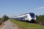 Triebwagen 357 (National Express) als RE7 in Richtung Köln Messe/Deutz in Kaarst, 20.