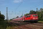 Am 06.06.2014 war die Freiburger 111 050-1 außerplanmäßig im RE-Dienst eingeteilt, als sie mit dem RE 26512 (Schliengen - Offenburg) aus dem Bahnhof von Orschweier ausfuhr.