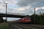 Am Abend des 28.05.2014 schiebt 111 061 die RB 26578 (Schliengen - Offenburg) aus Müllheim (Baden) dem nächsten Ziel Buggingen entgegen.