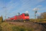 Am 09.11.2013 schob 146 116-9 mit falschem Bügel ihreren RE nach Offenburg aus dem Bahnhofsbereich von Müllheim (Baden) raus.