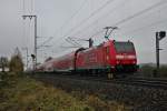 Nachschuss am 22.11.2013 auf 146 110-2  Müllheim (Baden) , als sie mit einem RE nach Offenburg den Bahnhofsbereich von Müllheim (Baden) verlässt.