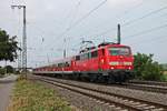 Einfahrt von der Freiburger 111 048-5 am 10.08.2015 mit ihrer RB (Offenburg - Basel Bad Bf) in den Bahnhof von Müllheim (Baden).