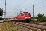 Einfahrt am 10.08.2015 von der Freiburger 111 054 mit ihrer RB (Offenburg - Basel Bad Bf) in den Bahnhof von Müllheim (Baden).