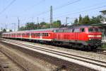 Die 218 444-8 zieht eine klassische RB von Mnchen nach Mhldorf durch Mnchen Heimeranplatz am 10.09.2012