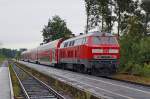 218 465-3 mit einem geschobenen Regionalexpress nach München im Bahnhof Schwindegg am 19.08.2013.