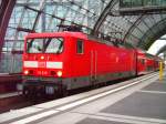Ohne Kontrollnummer unterwegs, die 114 028 mit dem RE 38017 nach Eisenhttenstadt in Berlin Hbf am 08.12.2009.