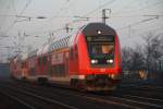 IRE auf dem Weg Magdeburg - Berlin Gesundbrunnen bei der morgentlichen Durchfahrt in Saarmund 17.1.2011