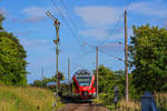 RE 9 einfahrend am Formsignal des Bahnhofs Lancken.