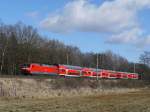 Eine BR 120.2 und Dostos als Hanse-Express RE 4308 Rostock - Hamburg zwischen Schwarzenbek und Aumhle; 26.02.2012  