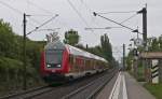 RE 5184 (Konstanz - Karlsruhe Hbf) mit Schublok 146 235-7 am 1. Mai 2010 in Konstanz-Wollmatingen.