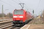146 109-4 mit einem RE bei der Ausfahrt am 05.04.2013 aus Orschweier gen Offenburg.