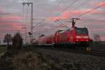 Nachschuss auf die Freiburger 146 114-4  Baden-Württemberg erfahren , als sie am 07.12.2013 ihren RE nach Offenburg bei Müllheim (Baden) gen Heitersheim schob.