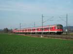 Die RB 59361 nach Bamberg mit schiebender 143 131-1 unterwegs am 22.Februar 2012 bei Knellendorf Richtung Kronach.