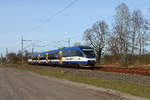 Der VT 734 (95 80 0643 407-9+95 80 0943 407-6+95 80 0643 907-8 D-NEBB) auf der RB 12 von Templin Stadt nach Berlin Ostkreuz am 25.03.2017 in Nassenheide.