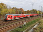 Durchfahrt Doppelstock Steuerwagen mit Schublok 112 182 als RE 5 nach Rostock auf dem südlichen Berlin Außenring am 13. November 2020 bei Diedersdorf.