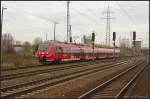 DB 442 326 als RE7 nach Wnsdorf-Waldstadt am 10.11.2012 bei der Einfahrt in den Bahnhof Berlin Schnefeld-Flughafen