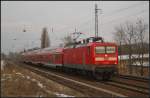 DB 112 190 mit dem RE3 nach Elsterwerda am 12.02.2013 Hhe Berlin-Karow unterwegs zum nchsten Halt Berlin-Gesundbrunnen