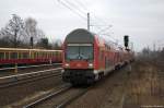 RB10 (RB 18968) von Berlin Hbf (tief) nach Nauen, bei der Einfahrt in Berlin Jungfernheide und geschoben hatte die 143 848-0.