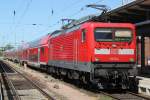 112 104-5 mit RE 4310 von Rostock Hbf nach Hamburg Hbf kurz vor der Ausfahrt im Rostocker Hbf.25.05.2012 