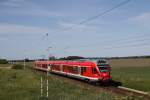 429 030 als RE 9 nach Rostock Hbf in Mönchhagen. Fotografiert am 05.06.2015.