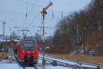 Am Sassnitzer Ausfahrsignal ,,C'' vorbeigefahrener DB Talent 2 bei leichtem Schneefall.