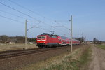 120 203-5 kurz nach dem Halt in Brahlstorf. Der Zug ist als RE 4312 von Rostock nach Hamburg unterwegs. Fotografiert am 02.04.2016. 