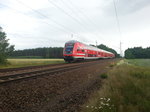 RB 18330 auf dem Weg nach Elsterwerda bestehend aus 3 Doppelstockwagen und einer BR 112 kurz vor Frauenhain am 18.06.2014 fotografiert.