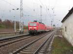 DB 143 053-7 mit dem RE 4668 von Halle (S) Hbf nach Kassel-Wilhelmshhe, am 12.04.2012 bei der Einfahrt in Sangerhausen.