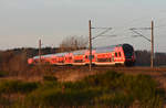 Nachschuss des RE1 mit der 120 201-9 in Front, zum Bahnhof Büchen.