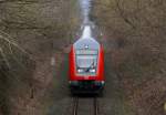 Eine von 218 330-9 geschobene Dostogarnitur als RE nach Kiel Hbf am 13.03.2011 in Timmdorf.