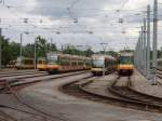 AVG Stadtbahn Wagen und VBK Straenbahnen im Depot Rheinhafen am 12.06.09 durch den Zaun fotografiert 