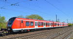 Überführung eines neuen ET 490 für die Hamburger S-Bahn (NVR soweit erkennbar 0 490 603-8 D-DB.....) am Haken von 152 034-5 am Bf. Saarmund, 21.04.20