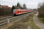 Am kalten 20.12.12 kam mir in Poing 423 865-5 nach Petershausen vor die Linse.