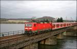 143 870 schiebt einen Zug der Linie S8 (Dortmund - Hagen als S5) von Dortmund Hbf nach Mnchengladbach Hbf. Im Hintergrund befindet sich der Harkortsee. Aufgenommen bei Wetter(Ruhr) am 02.03.2008.
