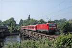 143 587 (9180 6 143 587-4 D-DB) schiebt einen Zug der Linie S8, (S5 Dortmund Hbf - Hagen Hbf), von Mnchengladbach Hbf nach Dortmund Hbf. (08.06.2008)