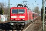 Die 143 583-3 zieht die S6 von Kln Nippes nach Essen in Dsseldorf Oberbilk ein am 07.03.2011