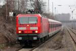 143 241-8 mit S 6 nach Kln-Nippes bei der Einfahrt in Dsseldorf-Rath 27.2.2013