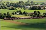 Schattenseiten -     Nicht nur die Bahn wurde von der Schattenseite her aufgenommen, auch die auf den ersten Blick recht grüne Landschaft hat ihre Schattenseiten mit der vielbefahren