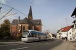 Wagen 1009 bei der Bgelfahrt ber den Neubauabschnitt  Riegelsberg Sd  -  Etzenhofen  vor der katholischen Pfarrkirche in Riegelsberg - zwischen den knftigen Haltestellen  Post  und