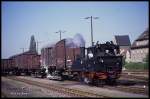 Mügeln am 3.5.1990: 99561 ist mit einem Kaolin Güterzug unterwegs nach Oschatz.