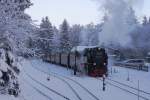 Schmalspur-Eisenbahnromantik im Winterkleid! Das Bild zeigt 99 7237 mit P8937 am 25.01.2013 auf Brockenfahrt, beim Zwischenstopp im Bahnhof Schierke und auch gleichzeitig, wie schn doch diese,