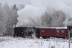 Ganz gemchlich dampft hier am 26.01.2013 99 7245 mit Sonderzug  Quedlinburger Brockenexpress  durch die Wendeschleife am Bahnhof Stiege.