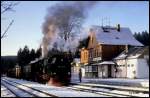 997231 fährt am 10.12.1991 um 11.28 Uhr in Drei Annen Hohne mit dem P 14404 nach Wernigerode ab.