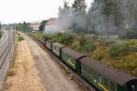 Entlang der krzlich erneuerten Hauptstrecke Dresden-Leipzig, dampft 99 1777 am 31.08.2012, nachdem sie gerade den Bahnhof Radebeul-Ost verlassen hat, mit P 3010 in Richtung Moritzburg.