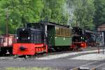 Zusammen mit einem Personenwagen und der frisch untersuchten 99 4511 steht 199 007 am 13.06.2011 in Jhstadt. Im Hintergrund steht noch die neugebaute I K No.54.